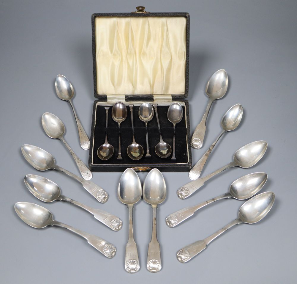 A set of nine George III silver fiddle and shell pattern teaspoons, London, 1814 and nine others including cased set of six.